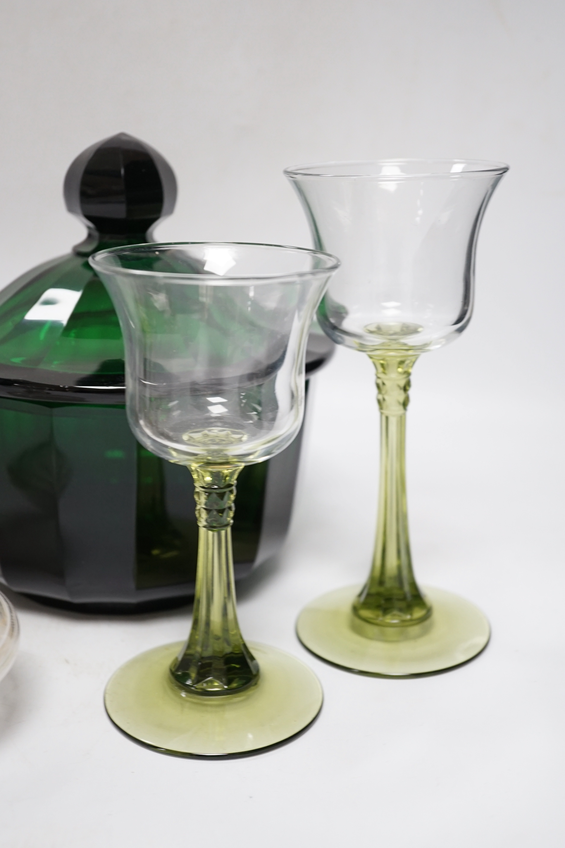 Ten cut glass etc. items, including a cut glass green lidded bowl, four cut glass cranberry bowls, three wine glasses, etc. tallest 19.5cm